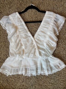 Delicate White Lace-Trim Peplum Blouse